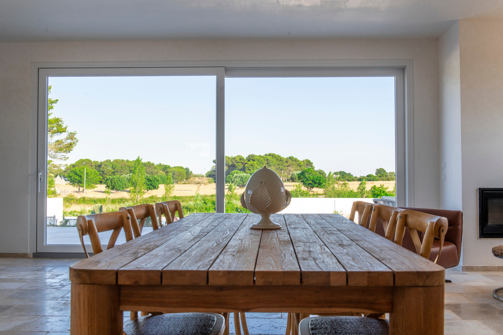 Interior dining table with countryside view, Residenza del Duca